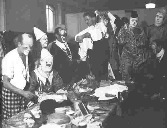 Clowns get ready for the first xmas show in the agricultural hall