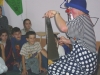 Bluey playing the saw, Kosovo, 2004