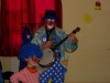 Bluey playing the banjo, Kosovo, 2004