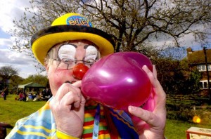 Bluey blowing up a balloon